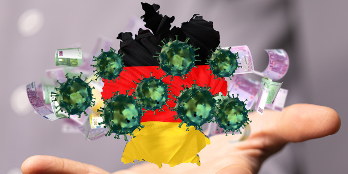 Helfende Hand mit Deutschlandkarte, Coronaviren und Geldscheinen.
